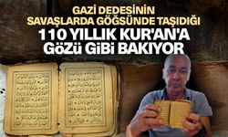 Gazi dedesinin savaşlarda göğsünde taşıdığı 110 yıllık Kur'an'a gözü gibi bakıyor