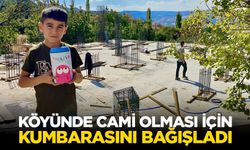 Köyünde cami olması için kumbarasını bağışladı