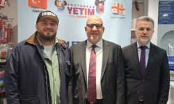 TDV'den Gürcistan'da 650 yetime giyim yardımı