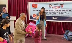 TDV, Kerkük'te ihtiyaç sahibi yetimlere kıyafet ve kırtasiye desteği sağladı