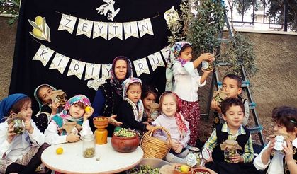 Alanya'da minikler "Zeytin Kırma" etkinliğinde buluştu