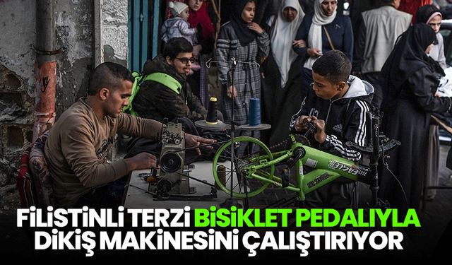 Filistinli terzi, bisiklet pedalıyla dikiş makinesini çalıştırıyor