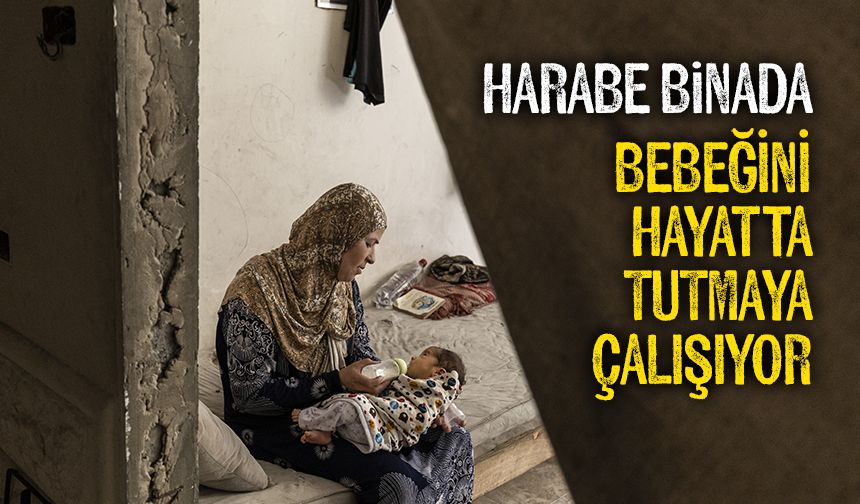 Gazzeli anne, harabeye dönmüş binada bebeğini hayatta tutmaya çalışıyor