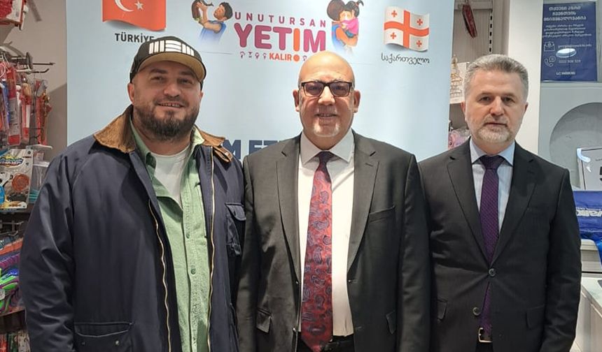 TDV'den Gürcistan'da 650 yetime giyim yardımı